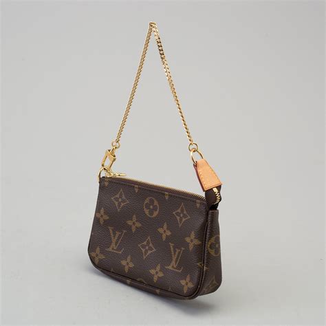 louis vuitton bag with pouch.